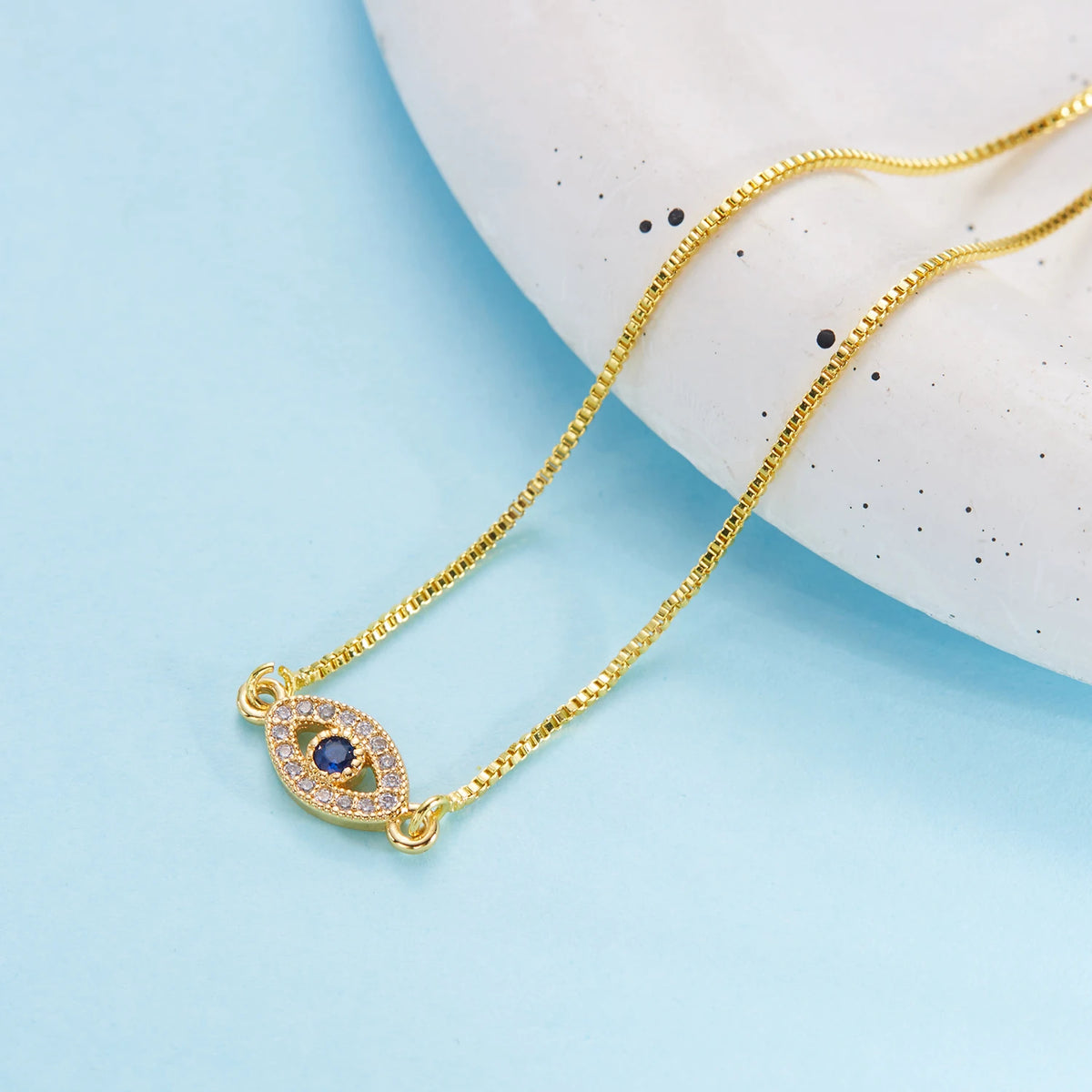 Gold Zircon Evil Eye